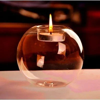 Clear handmade hollow glass spherical candle holder in European style.
