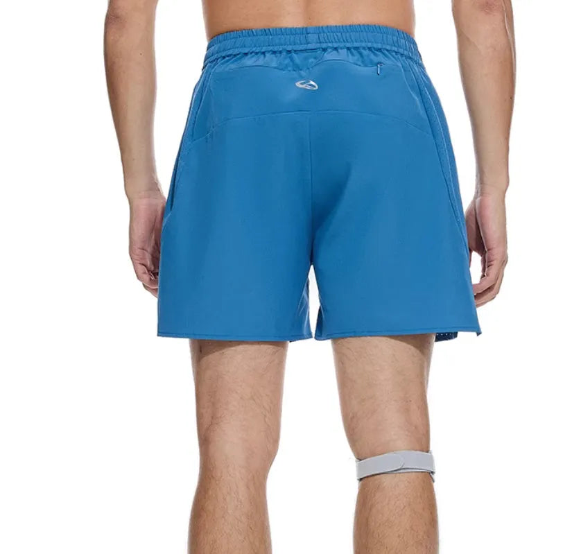 Black running shorts with laser-punched stitching on a manikin, showing stretch fabric for training.