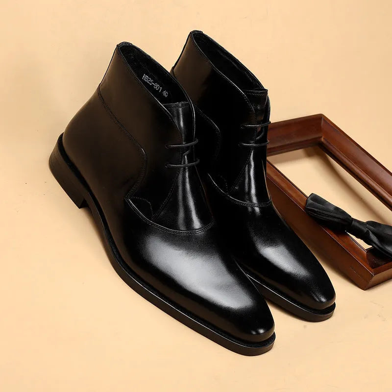 Martin men's autumn winter boot in black with high opening, leather stitching, and front lace up design