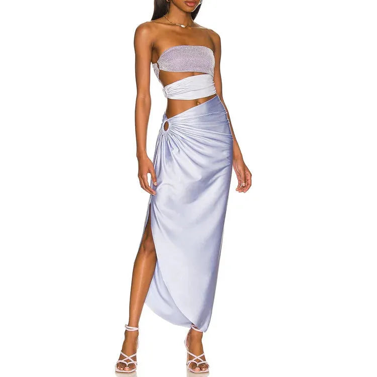 Purple one-piece swimsuit with a matching wrap skirt on a mannequin.
