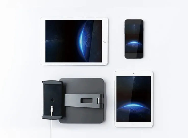 Foldable aluminium desktop stand holding a tablet at an angle.