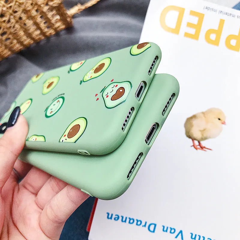 Green avocado cartoon design on a flexible black TPU phone case for iPhone.