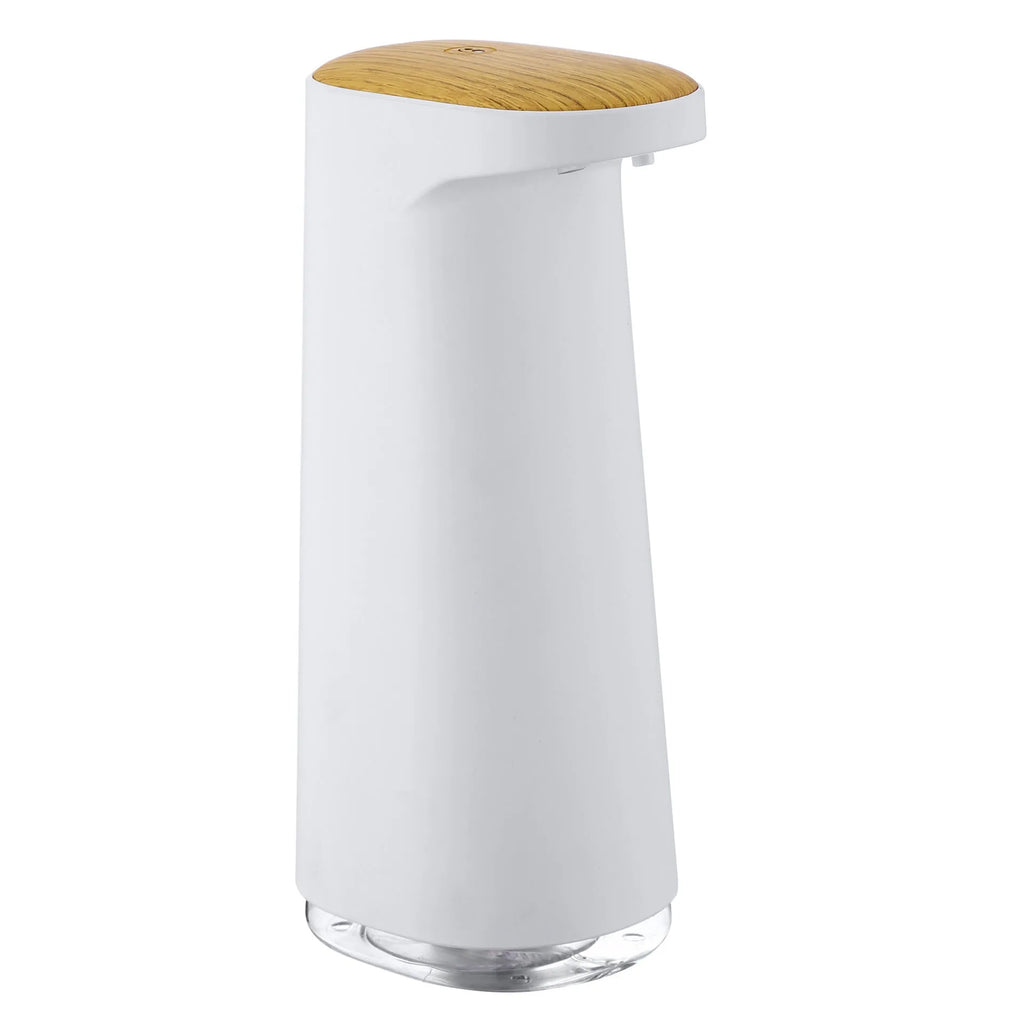 White automatic foam soap dispenser with infrared sensor on a bathroom countertop