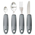 Stainless steel adaptive spoons and cutlery with black rubber handles for assisted eating.