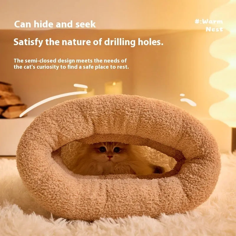 Brown semi-enclosed cat sleeping bag with plush cotton velvet and lambswool construction on a wooden floor.