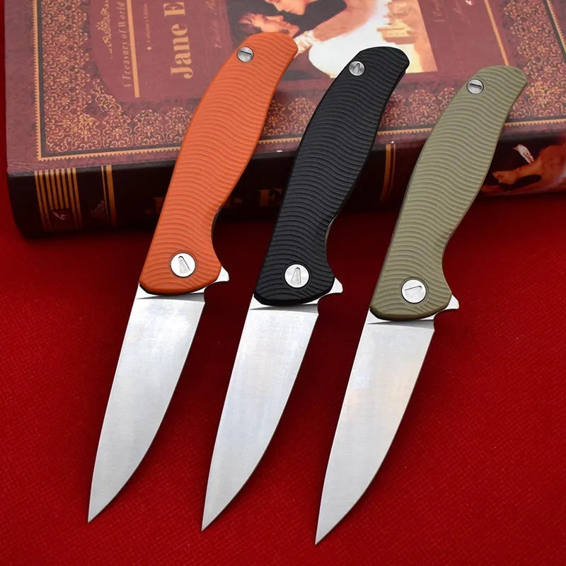 Outdoor folding knife with D2 steel blade, 9.6 cm blade length, 4.0 mm edge thickness, and nylon glass fibre handle in Black or Orange
