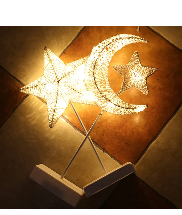 Rattan and copper wire LED table lamp in star, love heart, or moon shape for bedroom decoration.