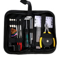 Open black guitar repair kit showing 12 metal tools including truss rod wrenches and a string winder in a zippered case.