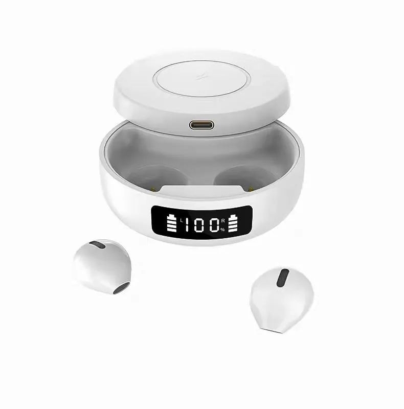 Pair of small black semi-in-ear wireless headphones sitting inside a white charging compartment with lid open.