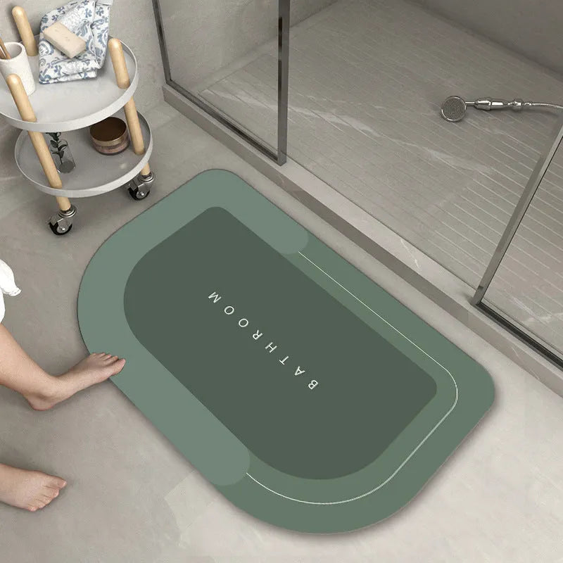 Cushioned bathroom floor mat with non-slip backing in blue colour showing oval shape on bathroom tiles