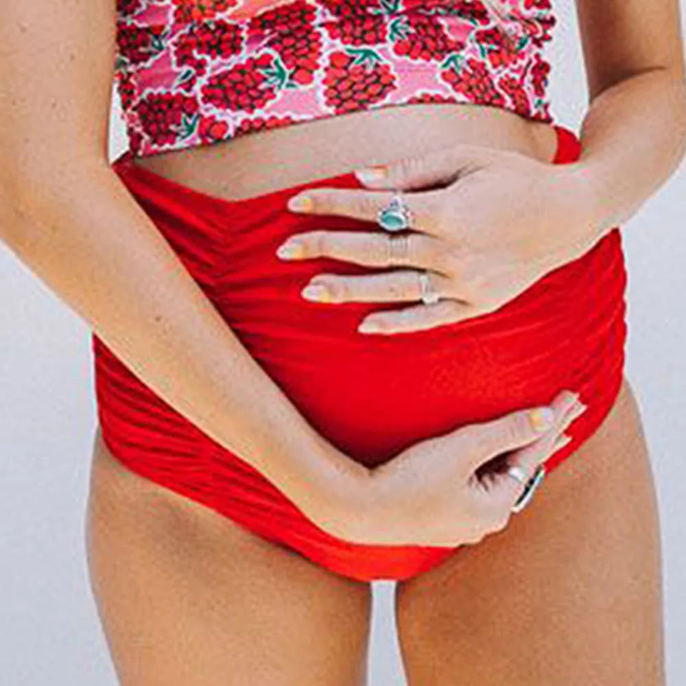 Red maternity high waist swimwear set with swim trunks for pregnant women in stretch fabric