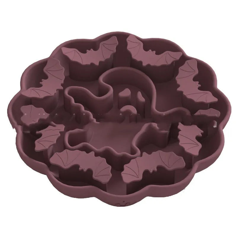 Silicone dog slow feeder bowl in a hexagonal shape on a floor, showing textured surface for slowing eating pace.