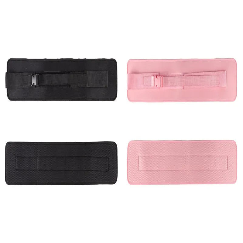 Black fitness training belt with auxiliary strap for weight-bearing hip bridge exercises