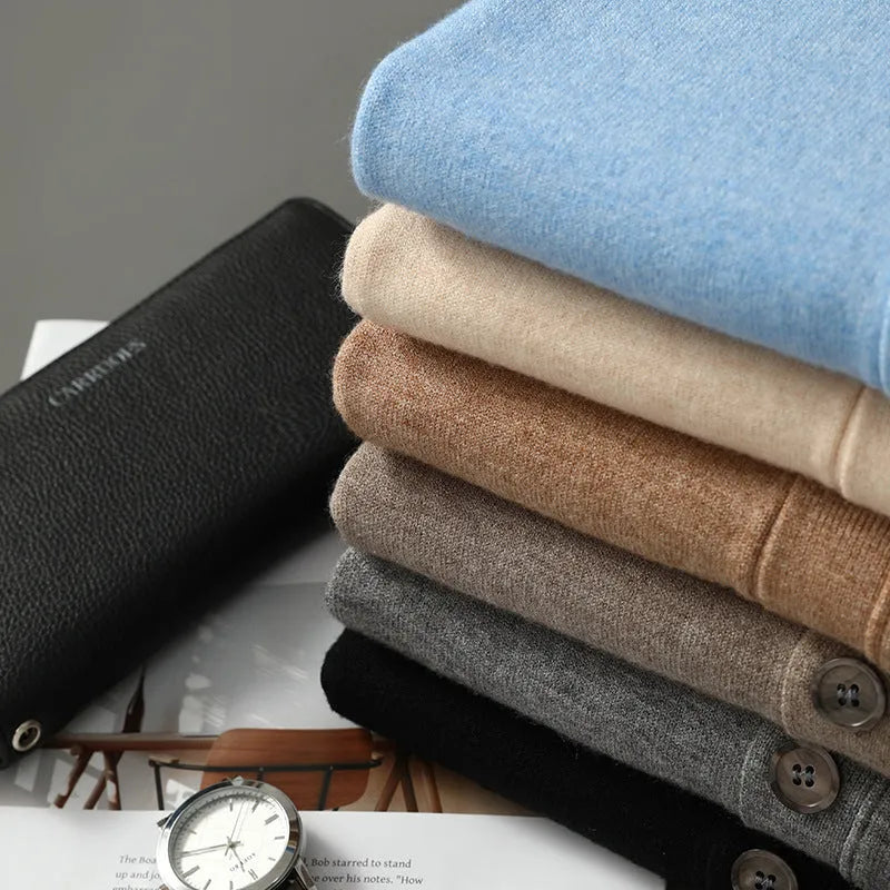 Man wearing beige Andy velvet v-neck cardigan coat with loose fit and long sleeves