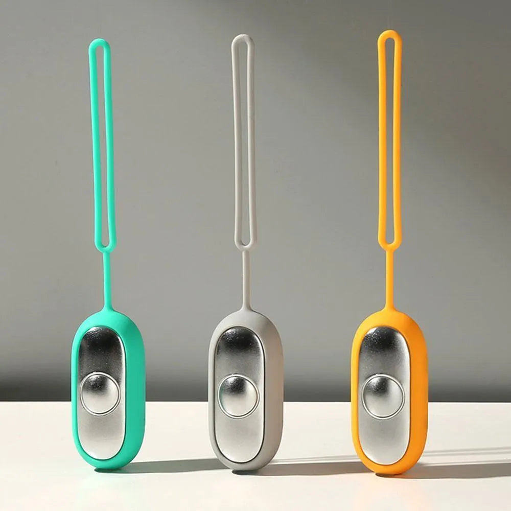 Hand-held micro-current sleep aid device with round button and USB charging port