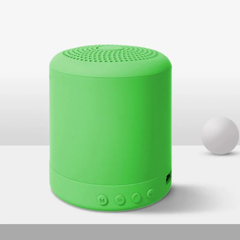A11 compact cube wireless speaker in black, pink, blue, or green colour with multiple input ports.