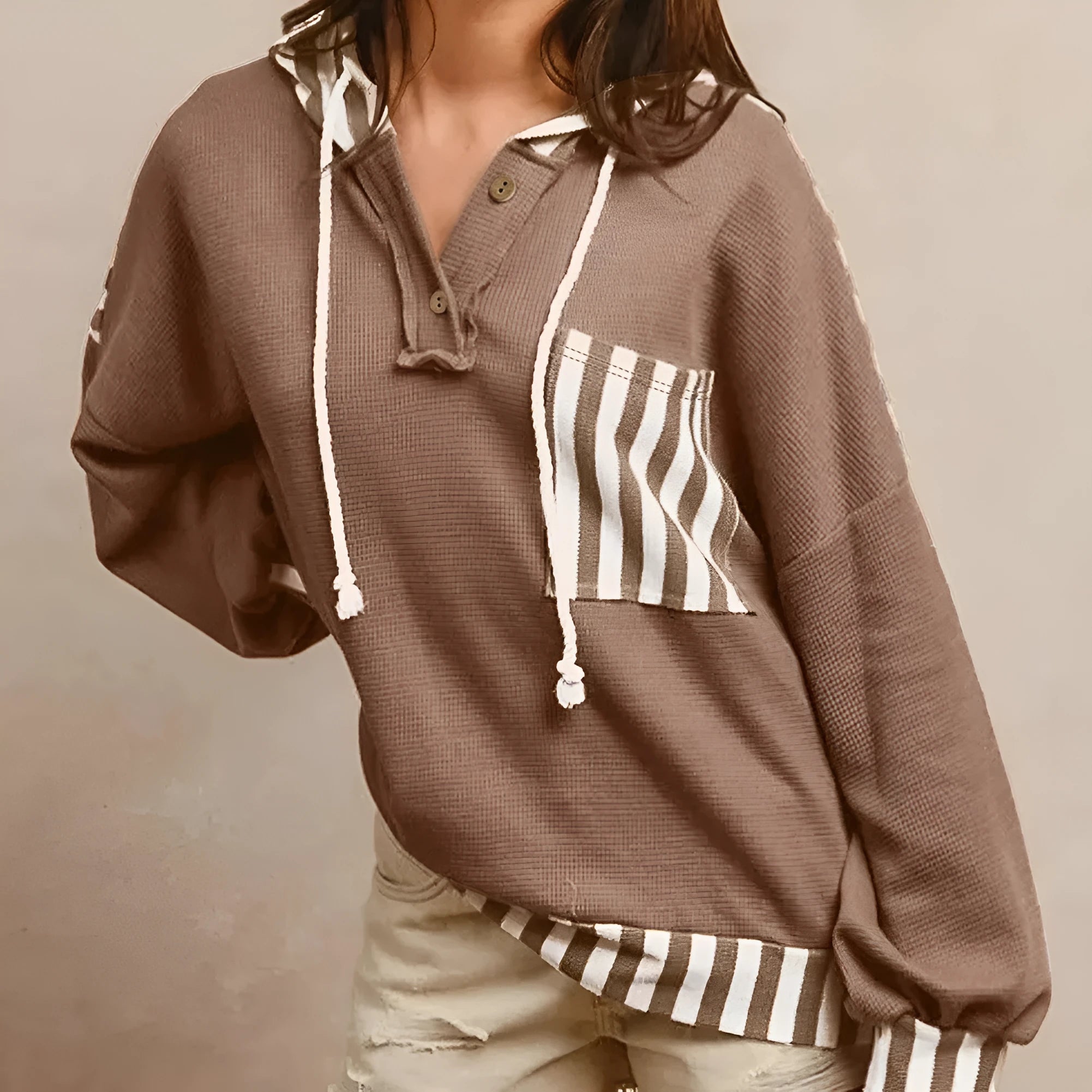 Straw yellow waffle texture striped hoodie with a button neck and drawstring hood.