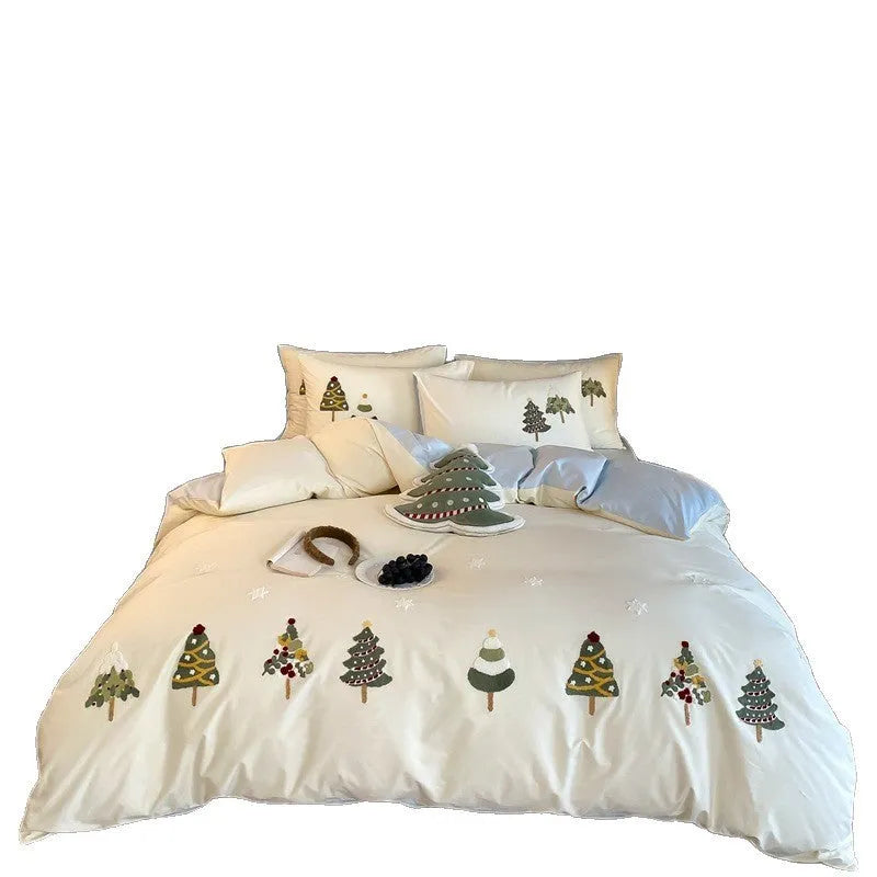 Cream blue duvet cover with raised towel embroidery Christmas tree design, part of a pure cotton four-piece bedding set.