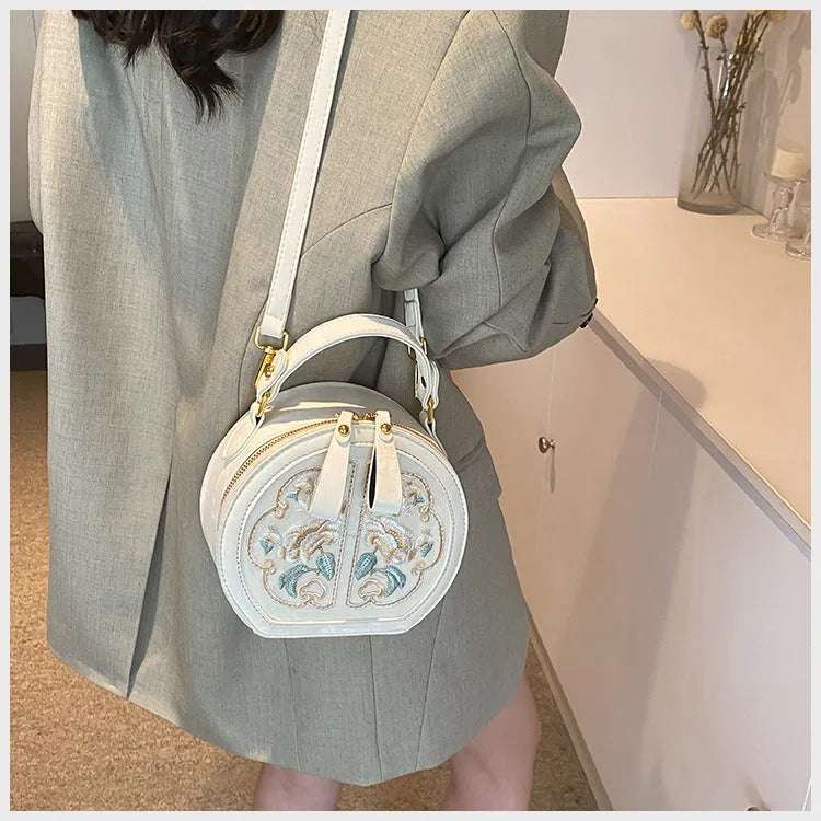 Chinese embroidery messenger bag in PU leather with square shape and adjustable shoulder strap