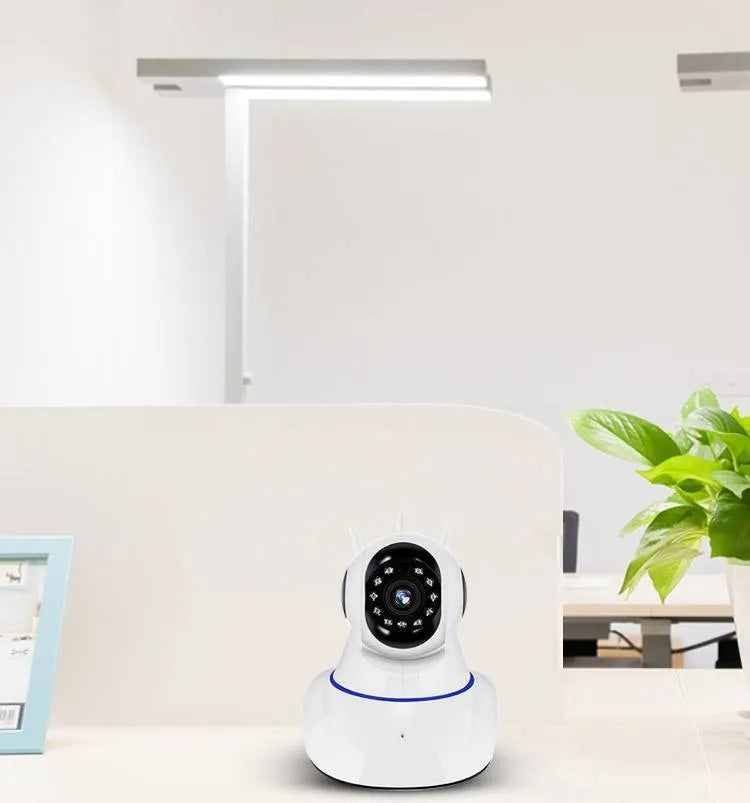 White dome-style wireless network camera with a 3.6mm lens for HD indoor and outdoor security.