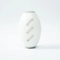 Green and white reusable gel lint roller balls for pet hair removal on fabric