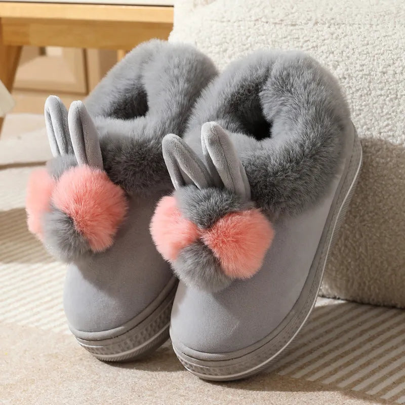 Women's black high heel slippers with thick sole and plush cotton upper, shown as an overshoe.