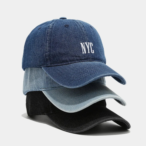 Retro denim peaked baseball cap with an alphabet letter, shown in light blue, dark blue, and black colours.
