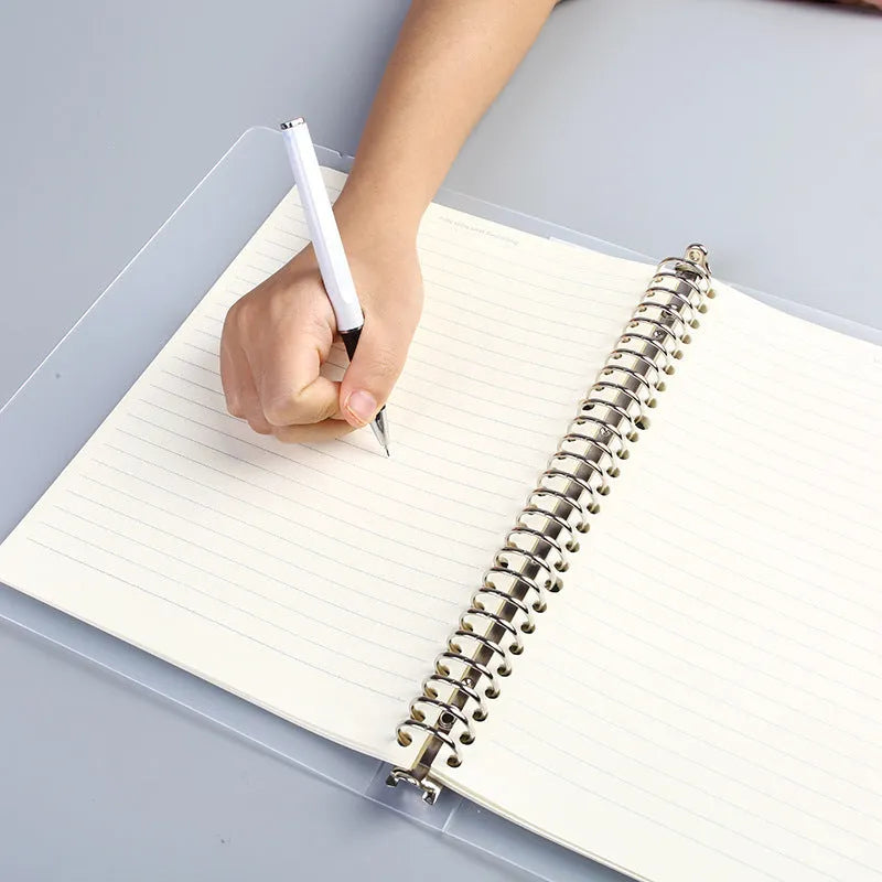 Class Notepad 26-hole A5 looped binder with PP matte cover on a desk.