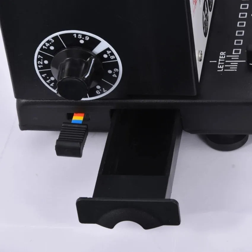 34 hole iron ring binding machine in black with two solid handles for A4 paper and 3:1 pitch double iron ring binding