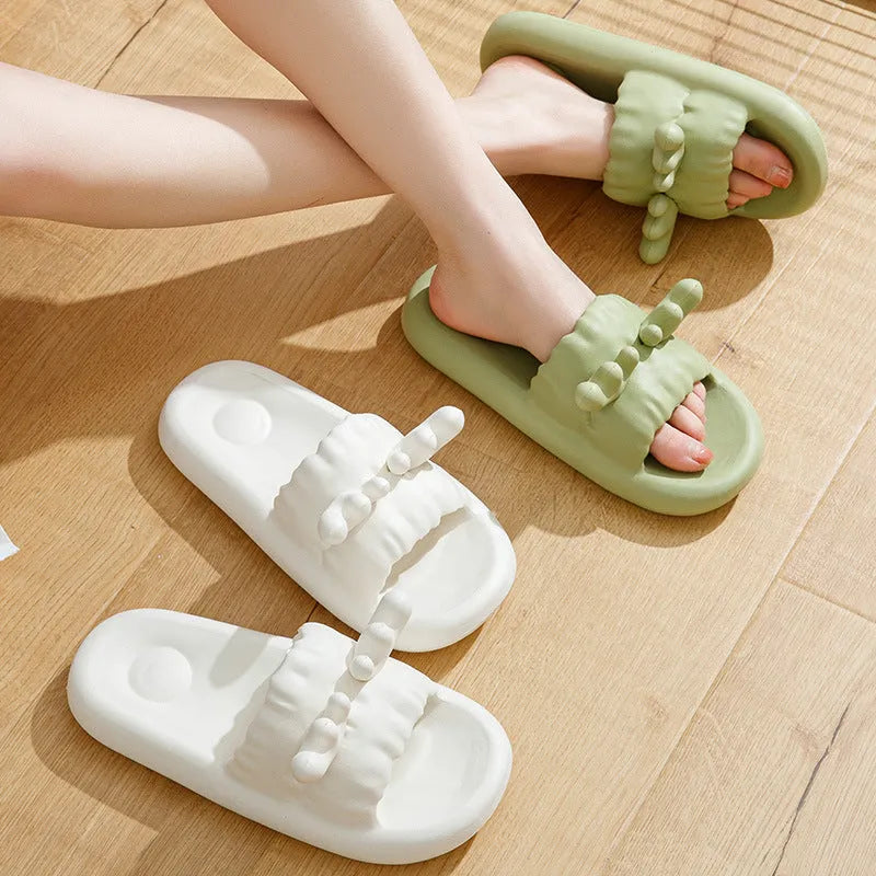 Deer horn design EVA flip flop slippers in light yellow on a non-slip sole.
