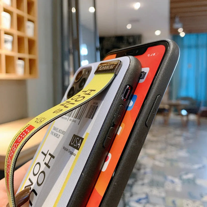 Red labelled TPU and PC mobile phone case for iPhone with an attached fabric wristband.