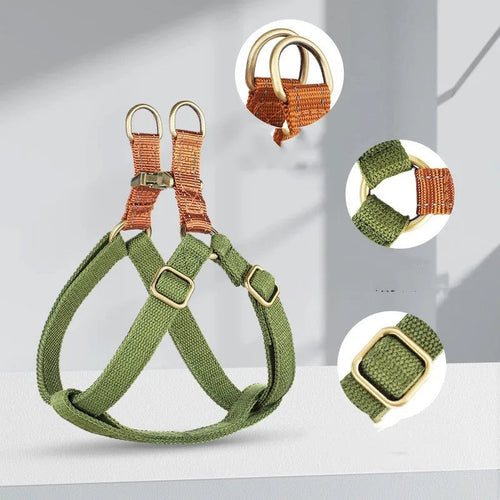 Brown vest-style dog leash harness on small dog showing chest design and alloy fastener