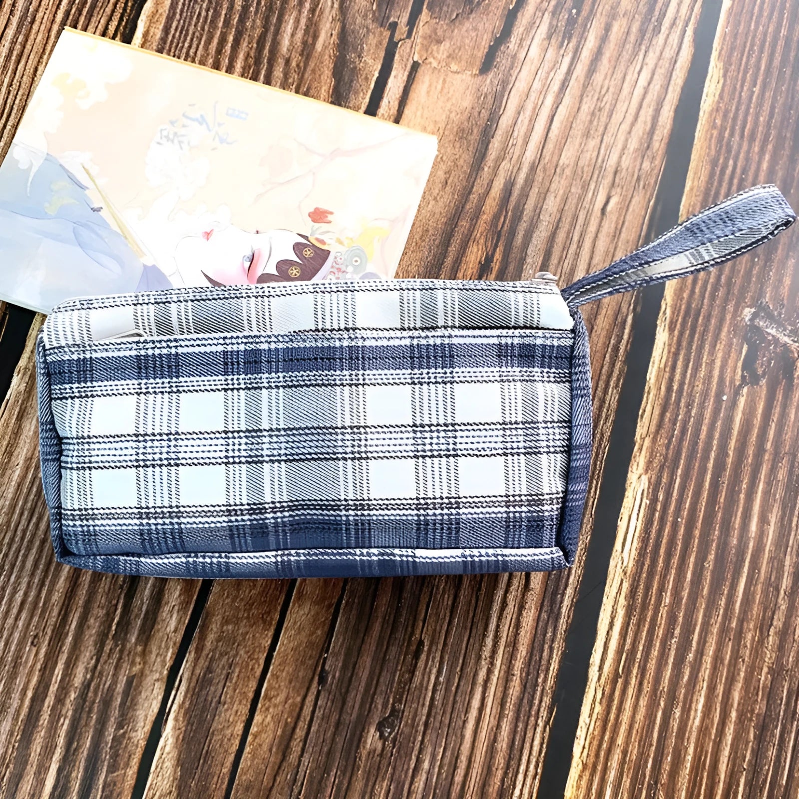 Square double-layer canvas stationery bag in a red stripe grid pattern.