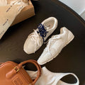 Women's retro training casual shoes in khaki with a flat heel and lace-up front.