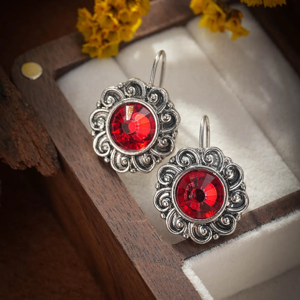 Retro bohemian carved ruby drop earrings for women in red alloy finish