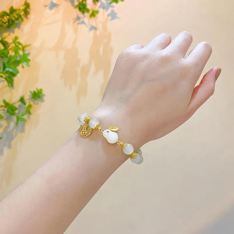 Chinese style glass bracelet with bamboo joint design elements in multiple colour options