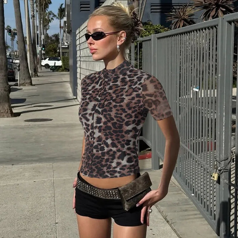 Women's leopard print slim fit short sleeve polyester pullover top in sizes S M L