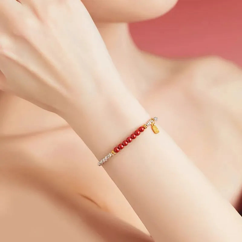 Geometric silver lucky beads couple bracelet on white background.
