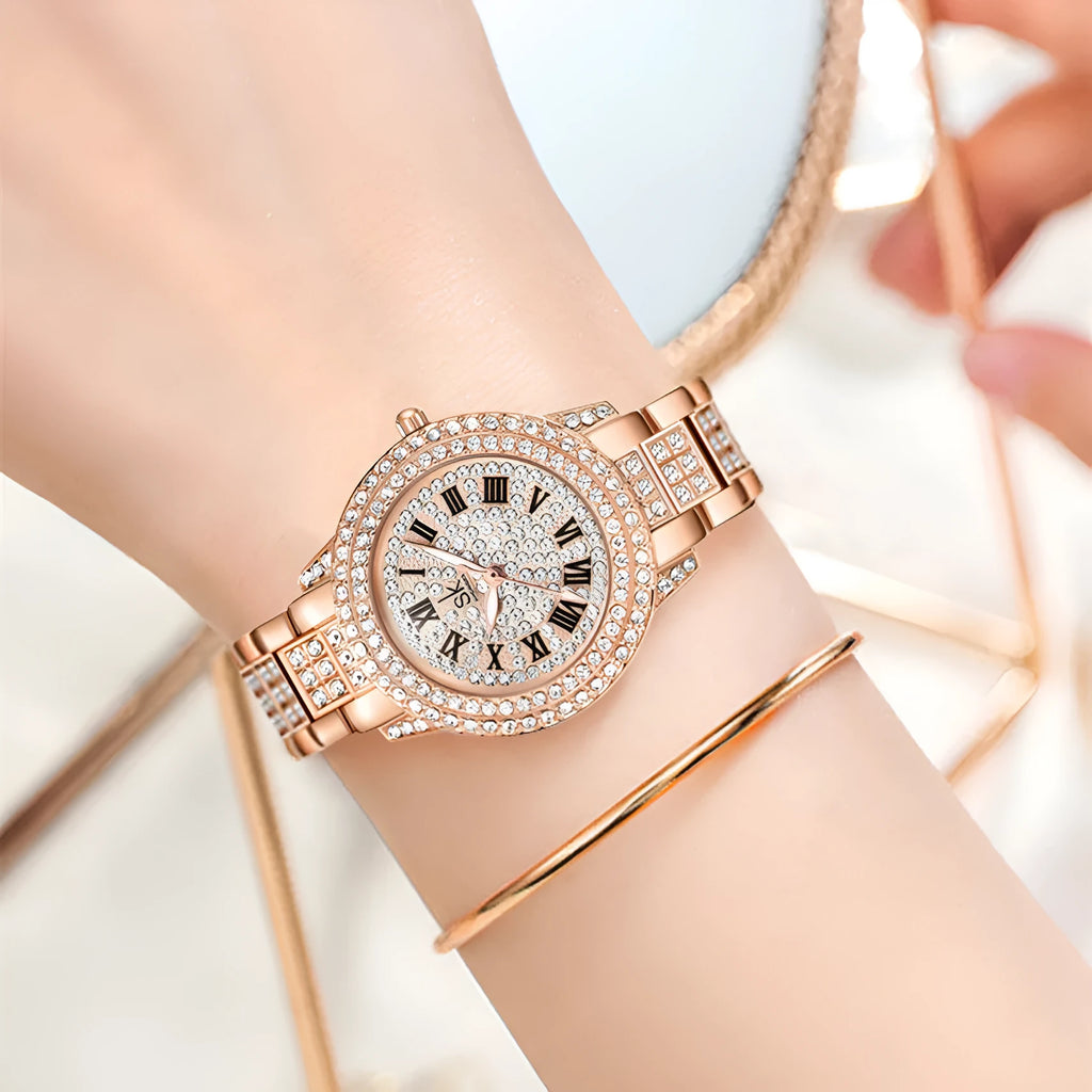 Women's gold alloy watch with diamond-like accents, slim 14mm strap, and 8mm dial on a white background