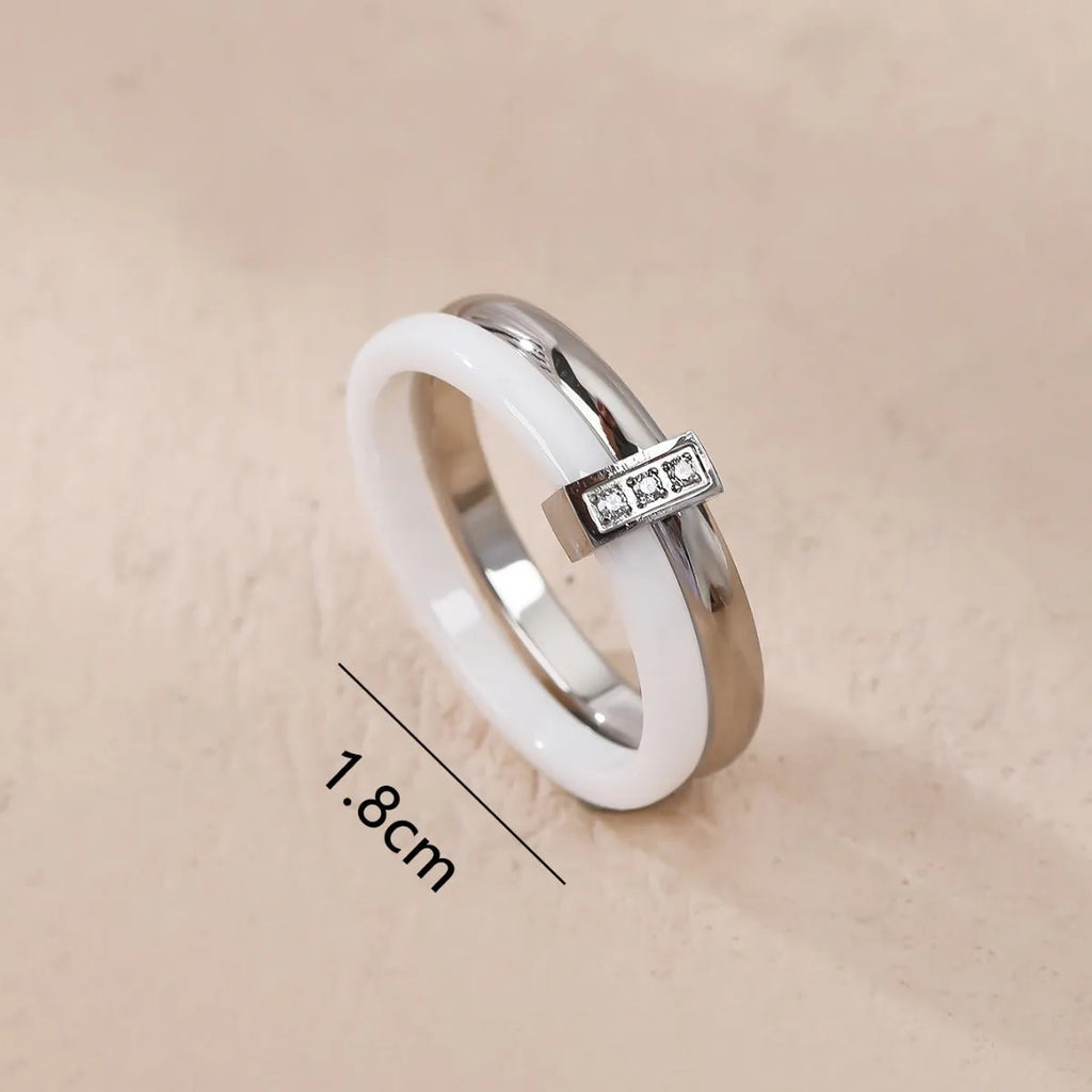 Women's titanium steel heart-shaped double ring with inlaid zirconium stones in gold black finish
