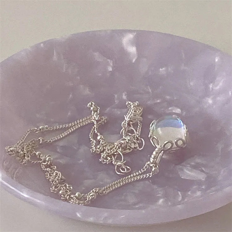Women's 925 silver curb chain necklace with a round geometric stone pendant.