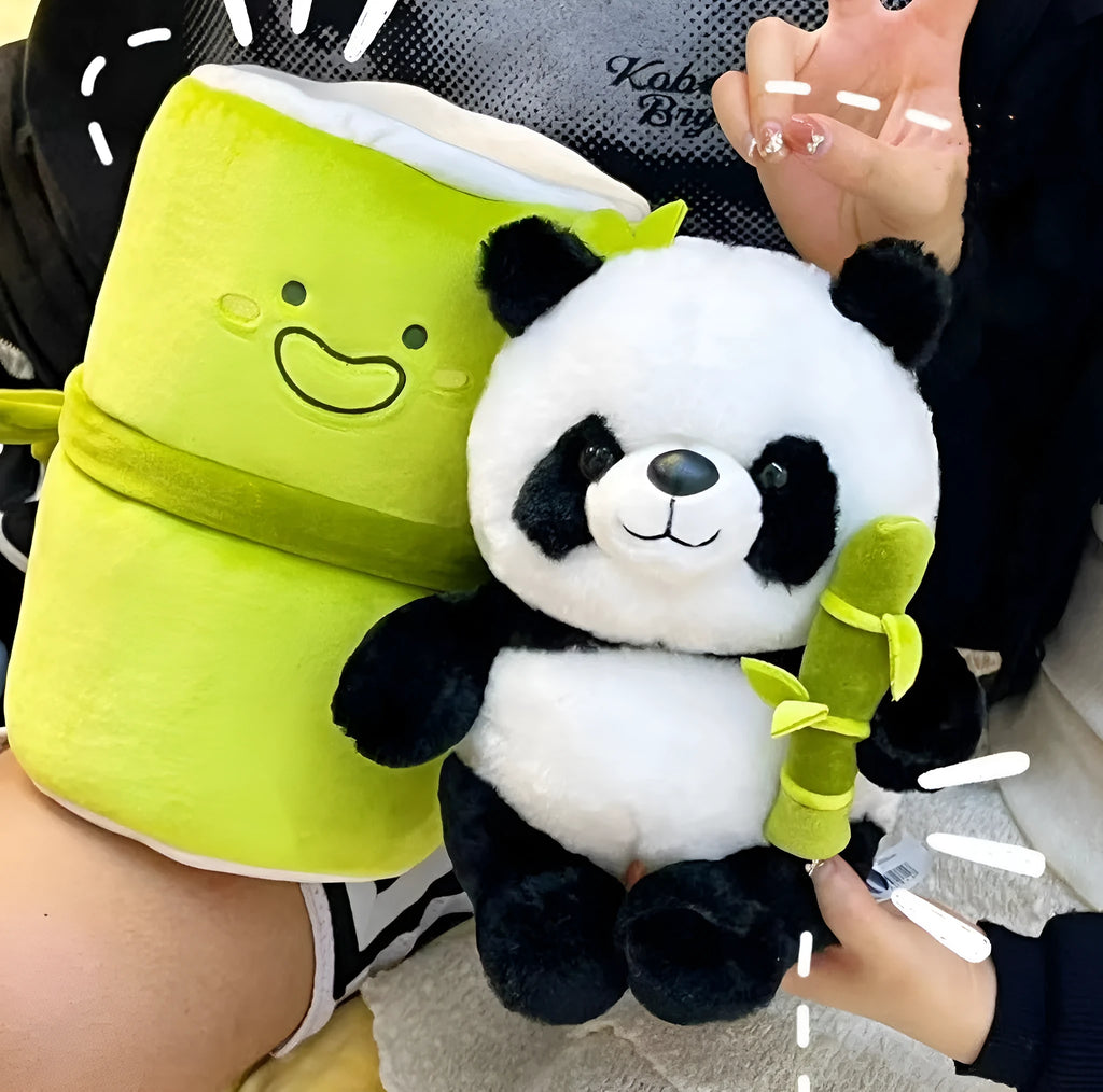 Black and white panda plush doll holding a simulated bamboo tube, a soft decorative cushion.