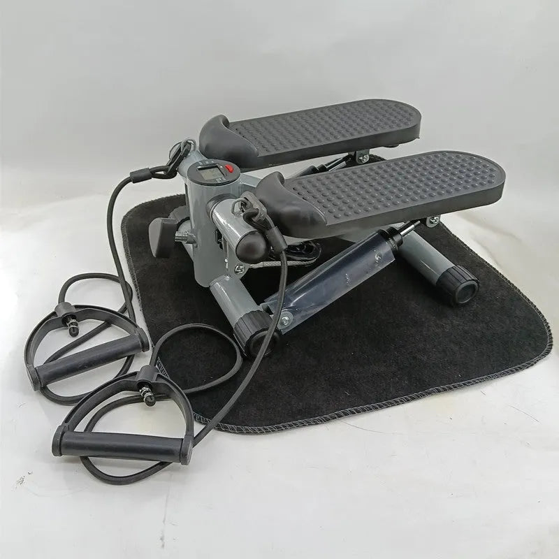 Silver grey hydraulic mini treadmill for home waist slimming fitness.