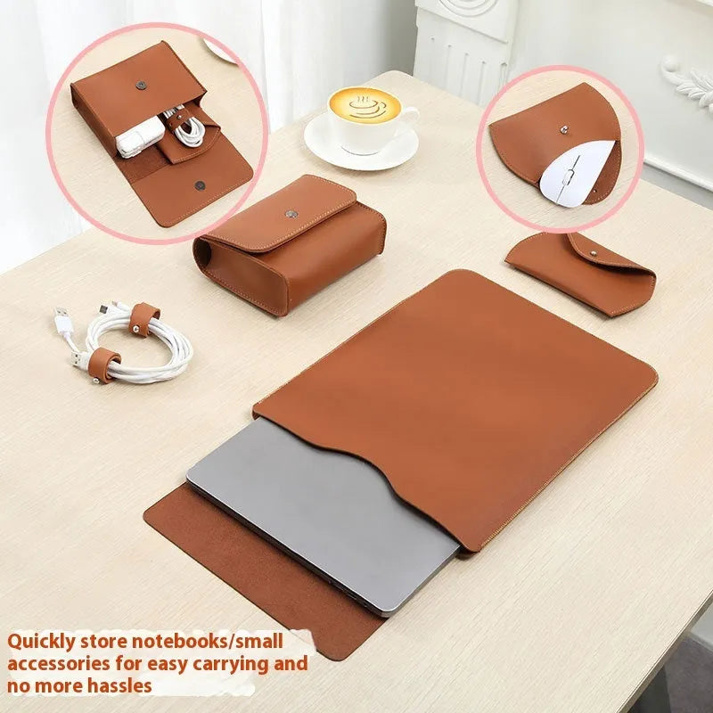 Set of four lock edge imitation leather protective covers for laptops in different colours.