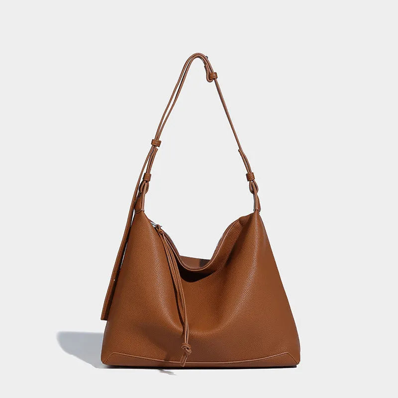 Large capacity caramel coloured underarm shoulder messenger bag made from soft PU material