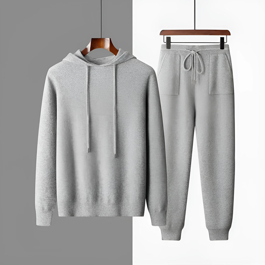 Men's light grey cashmere hoodie and matching trousers casual set laid flat.