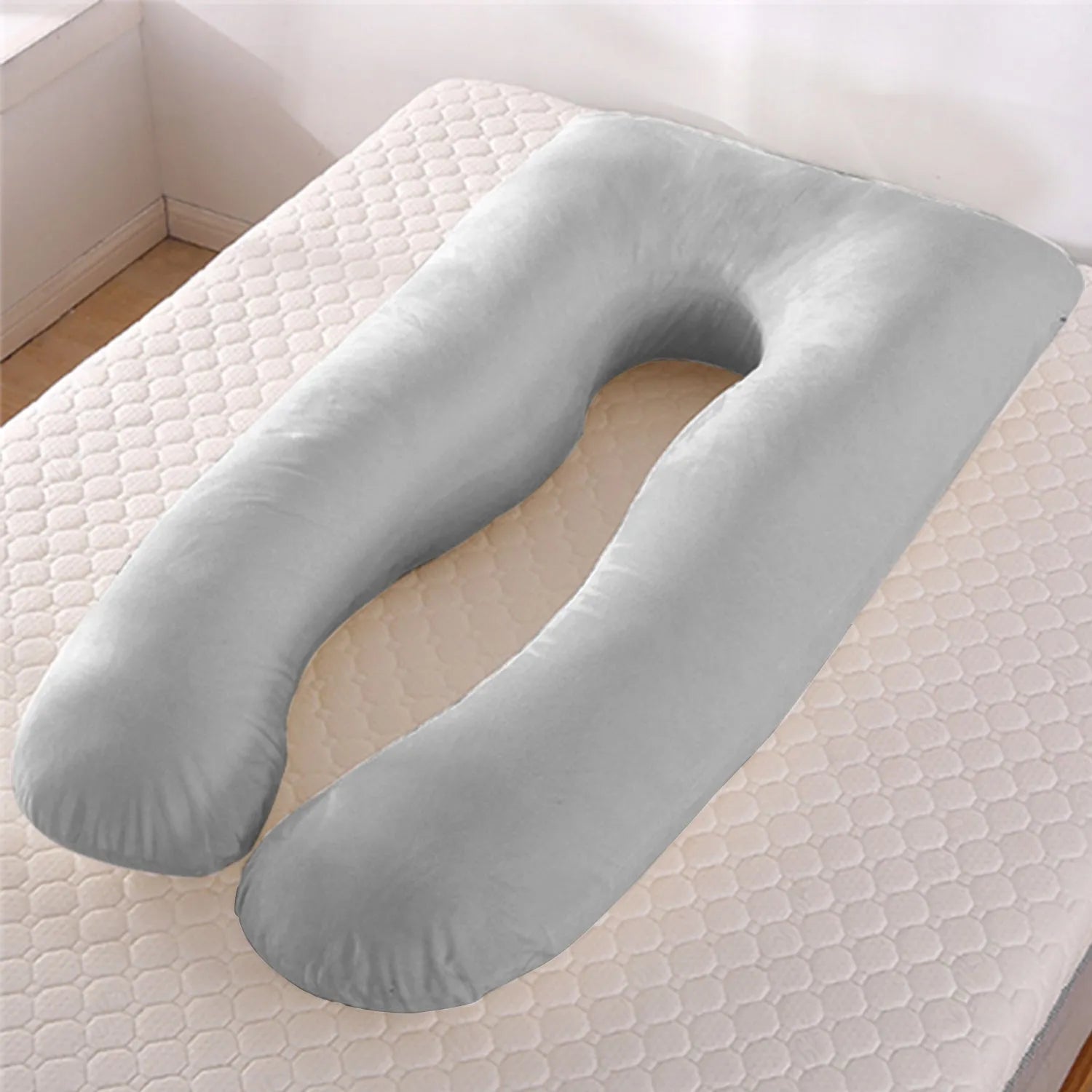 U-shaped pregnancy pillow in ice silk fabric shown in light blue colour, demonstrating its supportive shape.