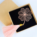 Brass electroplated metal bookmark with hollow-out leaf design and rose gold tassel