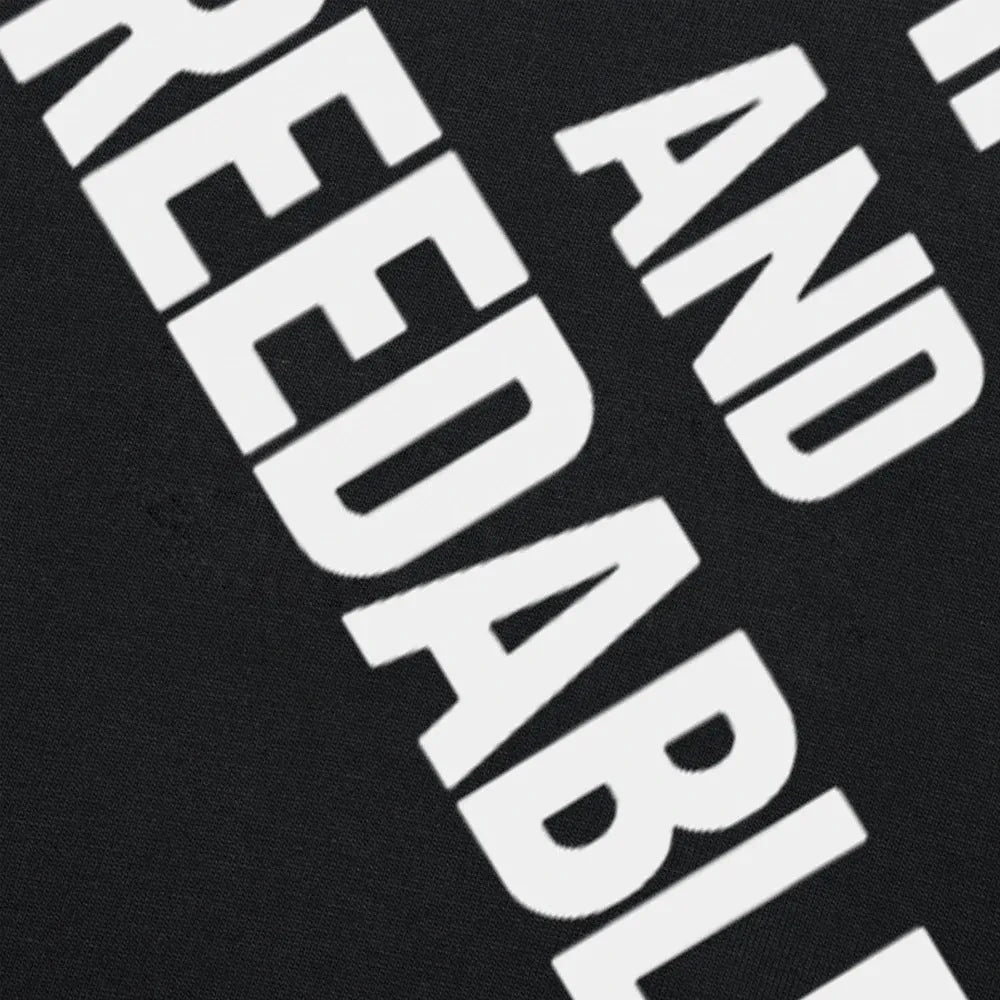 Pure cotton loose fit T-shirt with obedient and reproducible humour text print in black and white options