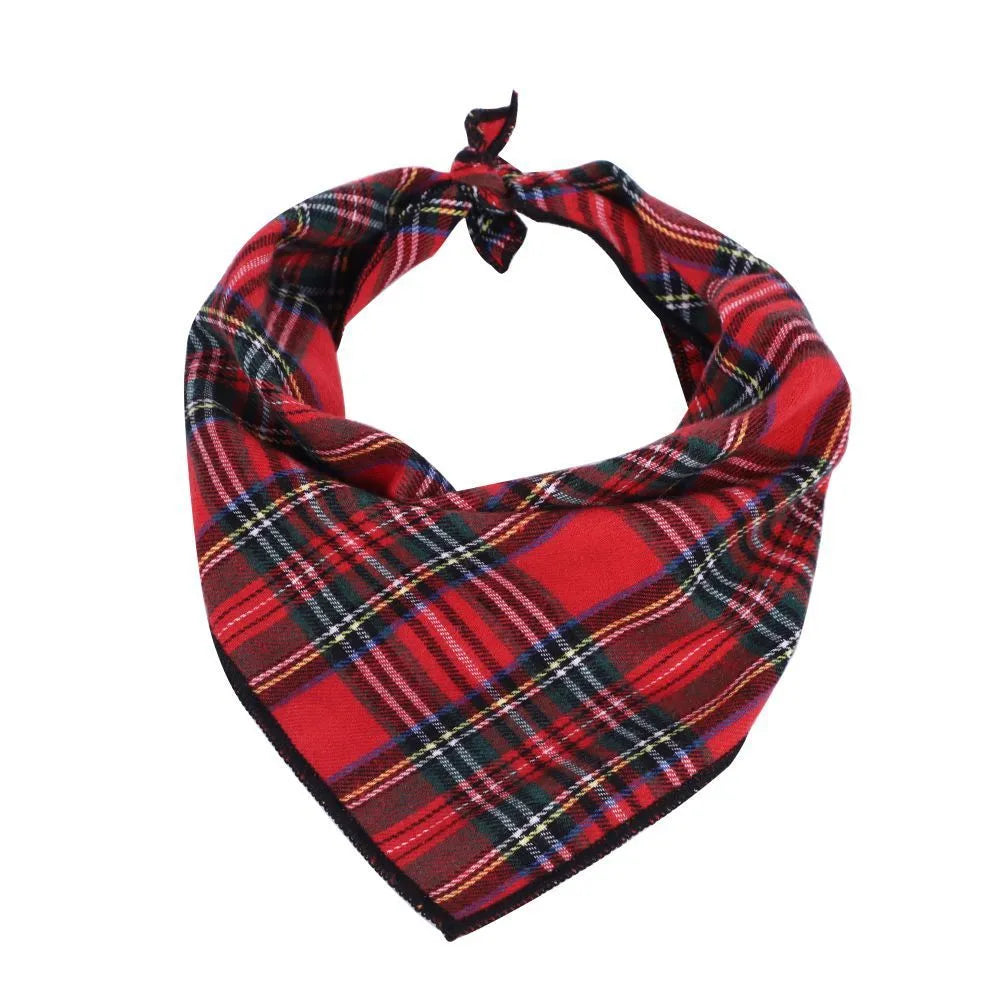 Red plaid Christmas triangle pet towel with embossed pattern, measuring 60x45cm, tied around a dog's neck.